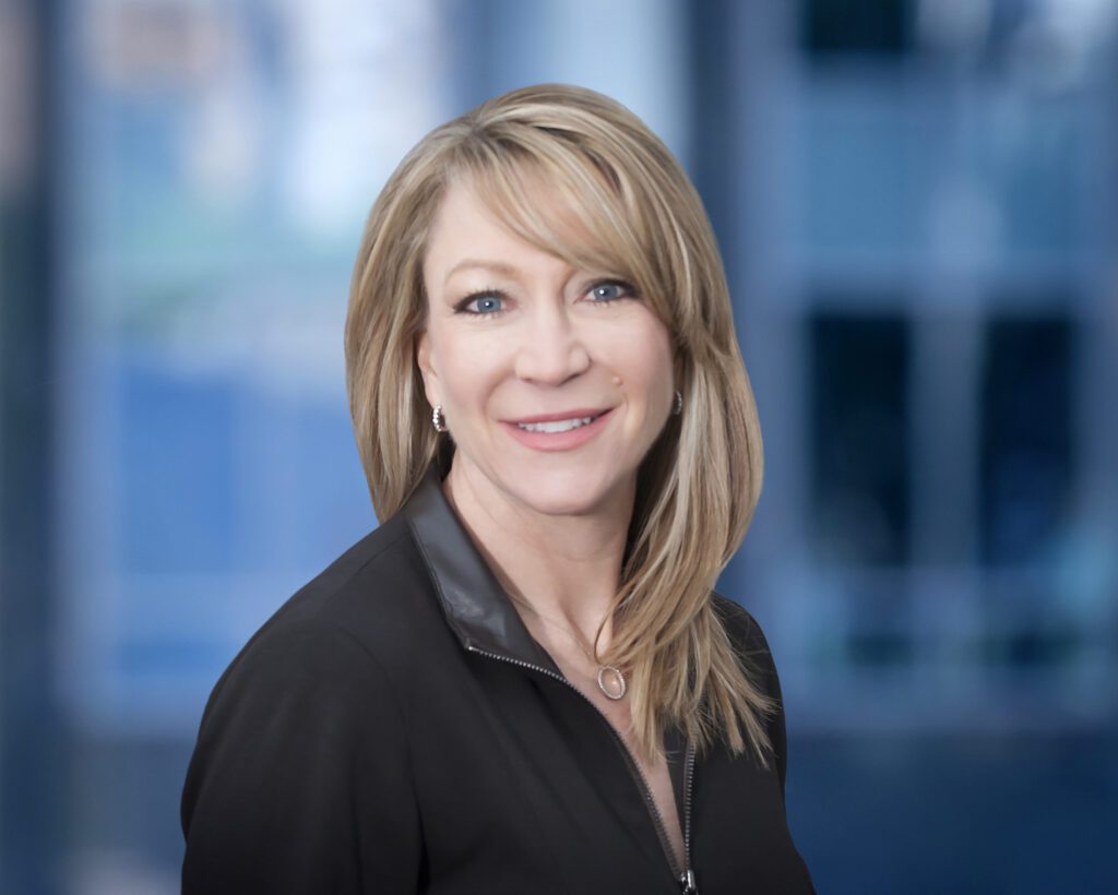 Picture of a smiling woman posing for a photo